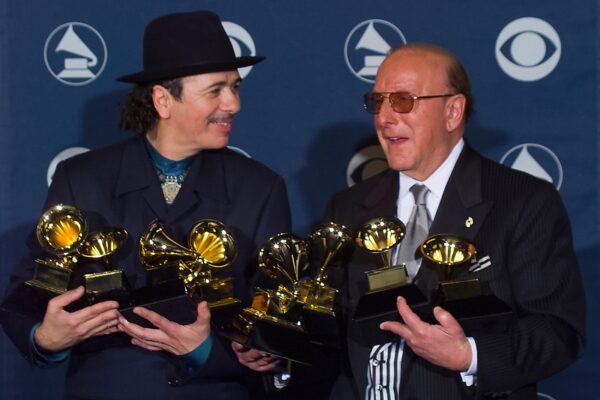 Carlos Santana Remembers ‘Visionary’ Record Exec Clive Davis: He ‘Recognized the Light in People’