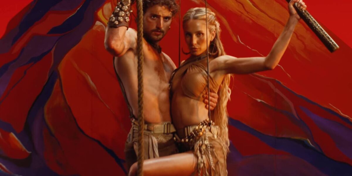 Benson Boone and Alix Earle Fight Dragons, Lock Lips in ‘The Time of My Life’ Video