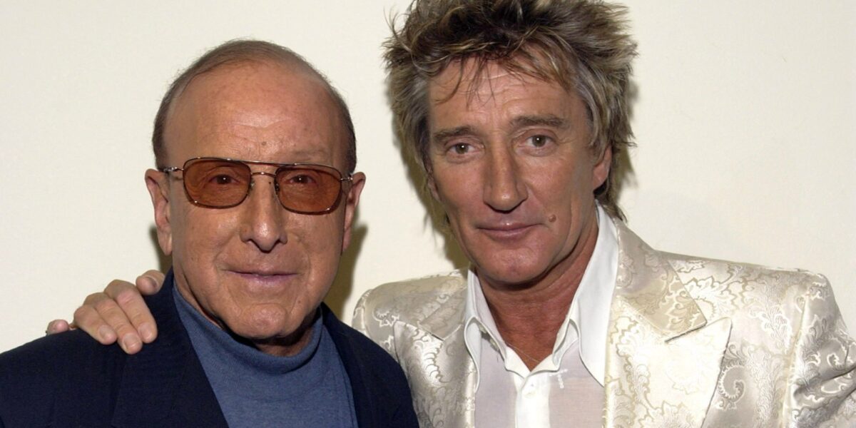 ‘A Giant of a Man’: Rod Stewart, Carlos Santana, Patti Smith, More Pay Tribute to Clive Davis