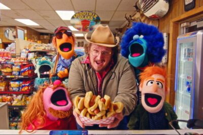 See Willi Carlisle and a Puppet Tyler Childers Make a Wacky Gas Station Run in New Video