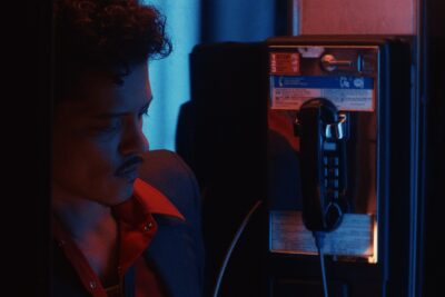 See Bruno Mars Serenade Karol G in New ‘Dance With Me’ Video
